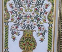 Décoration Murale d'un Vase Fleuri en Céramique d’Inspiration Andalouse